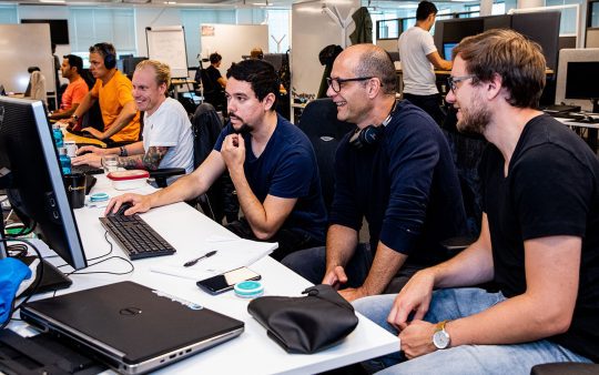 Group of people working in front of computers