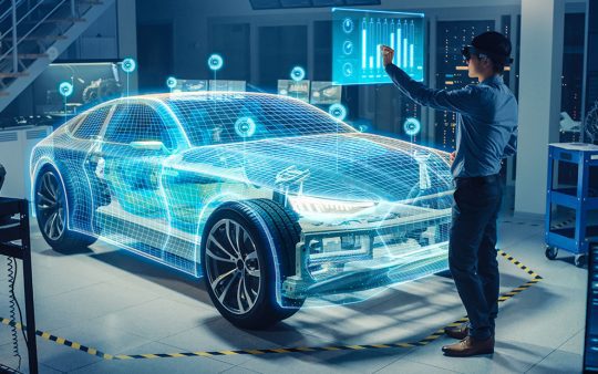 man working on futuristic virtual 3D car model