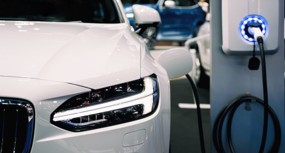 Smart EV Routing – A dynamic digital product for optimized EV travel Close-up of an electric car charging