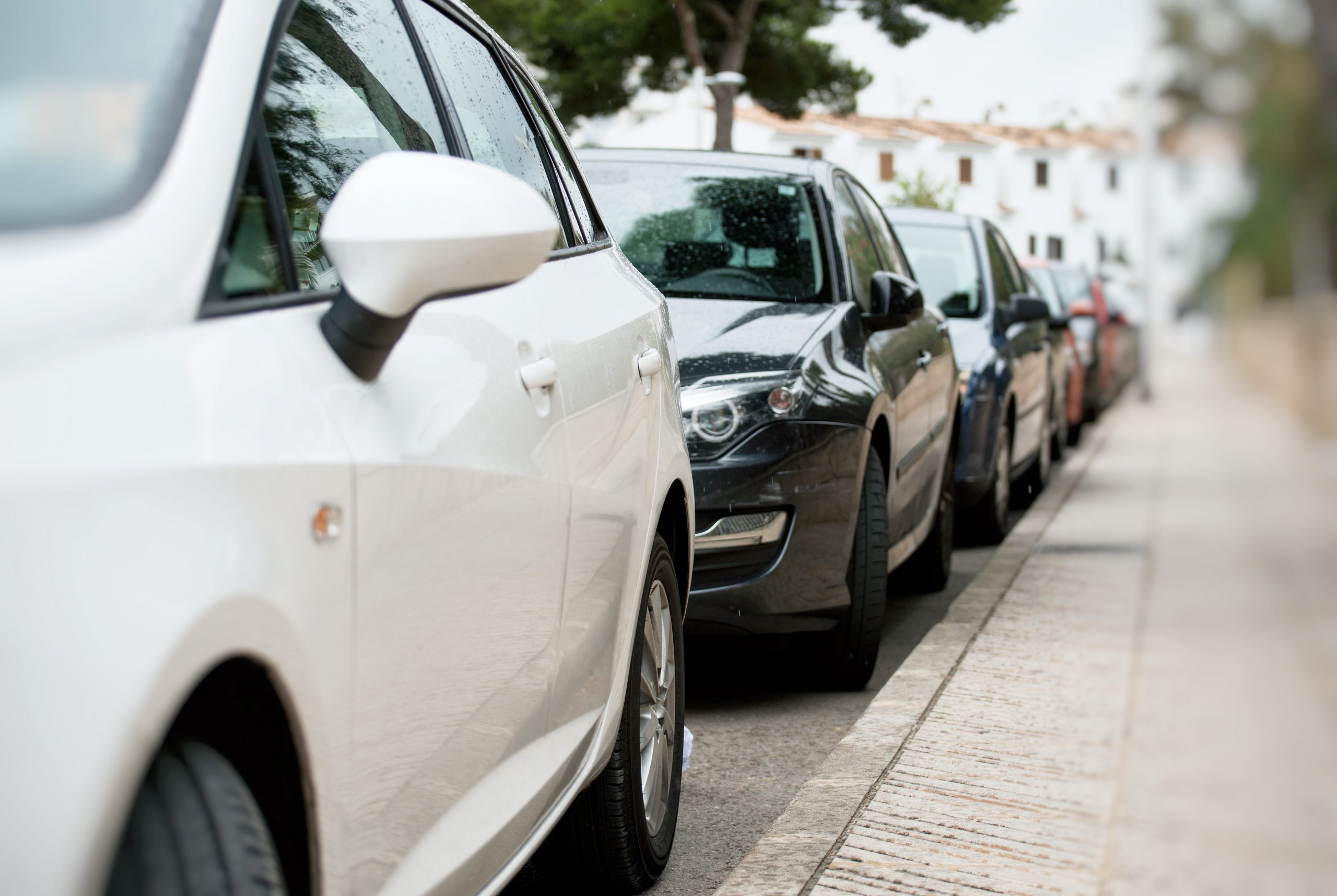 cars parked along a street