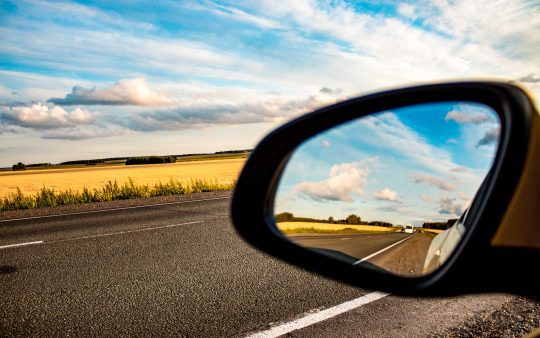 The road in the rear view mirror