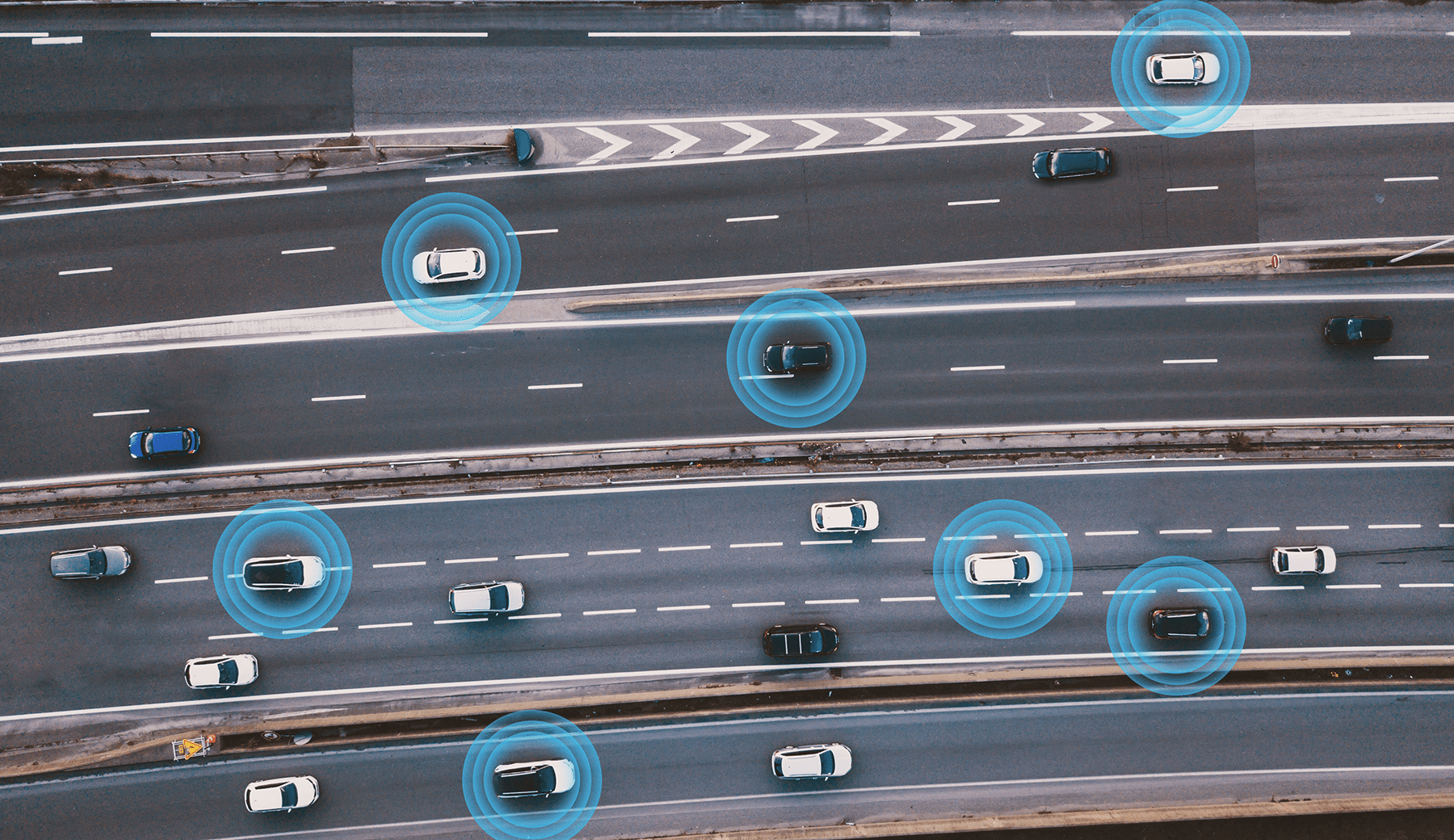 aerial top view of cars driving on the road