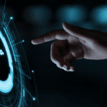 a hand touching an interactive screen