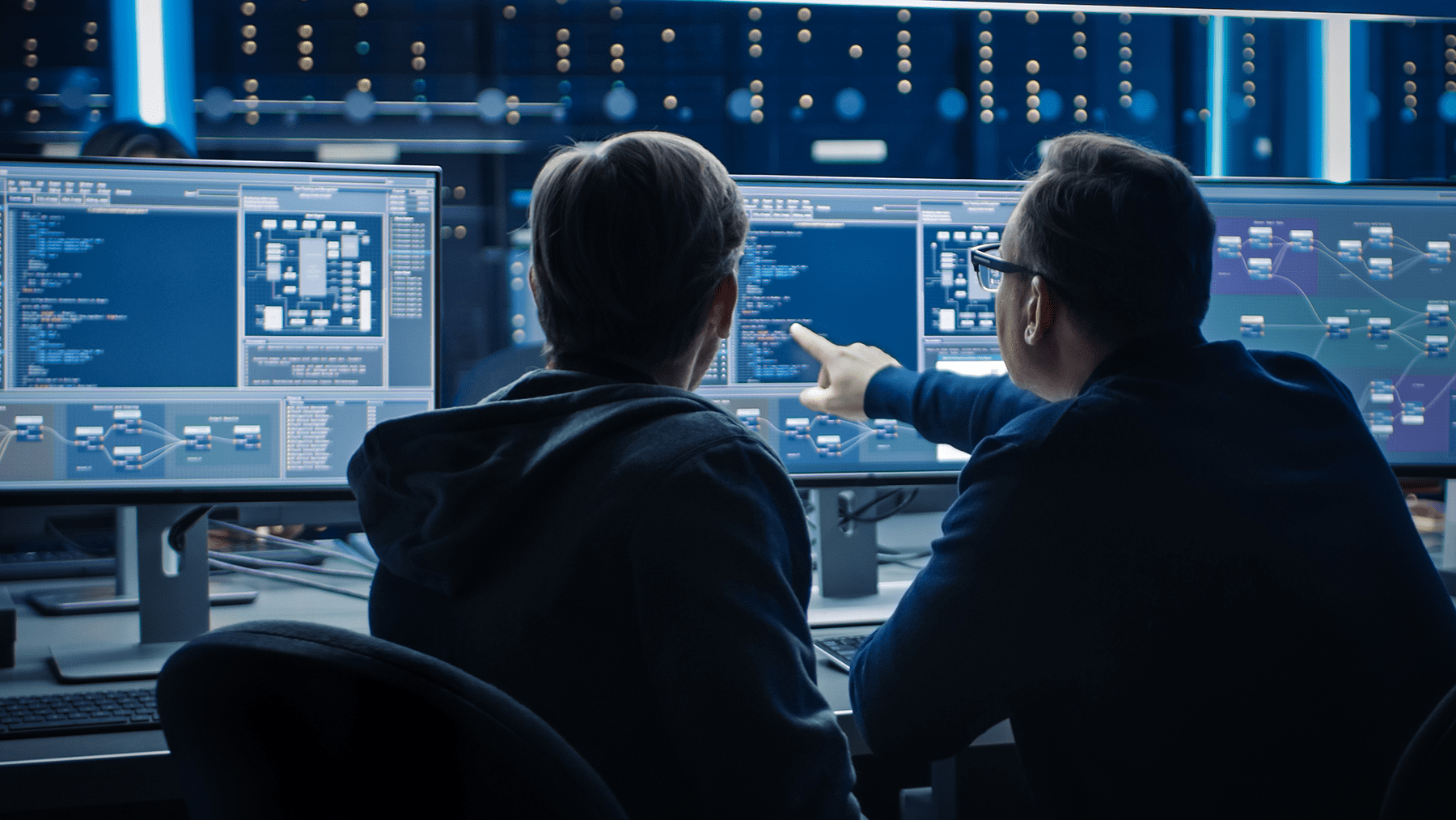 IT Programers Discussing Blockchain Data Network Architecture Design